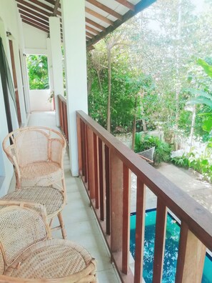 Deluxe Room, Balcony, Pool View | Balcony view - Comfort Guest house (Bentota)