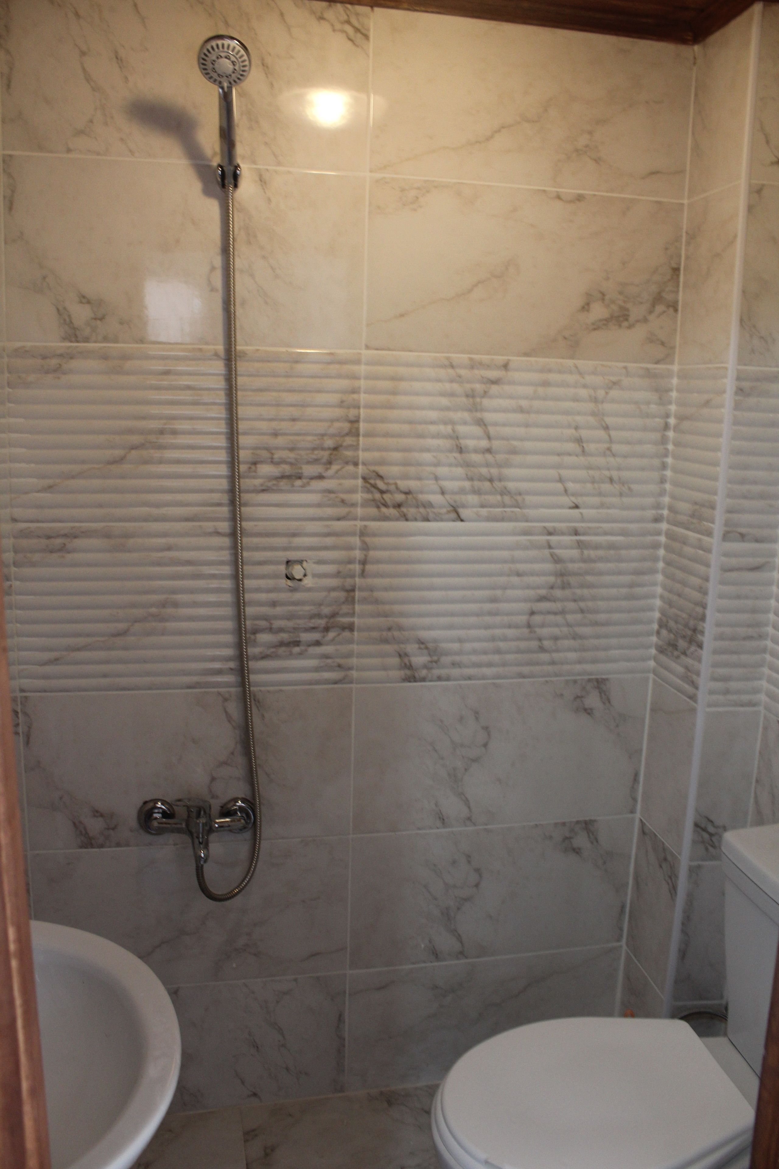 standard triple room, city view | bathroom | bathtub, free toiletries, hair dryer, slippers