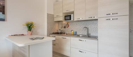 Apartment, 1 Schlafzimmer | Essbereich im Zimmer