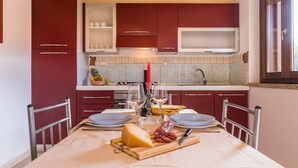 Apartment, 1 Bedroom | Private kitchen - AffittaSardegna - Casa Pedra 2 (Dorgali)