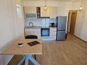 Premium-huoneisto, merinäköala (104) | Yksityinen keittiö