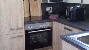 Bungalow Confort, 2 grands lits, non-fumeur, vue montagne | Cuisine privée