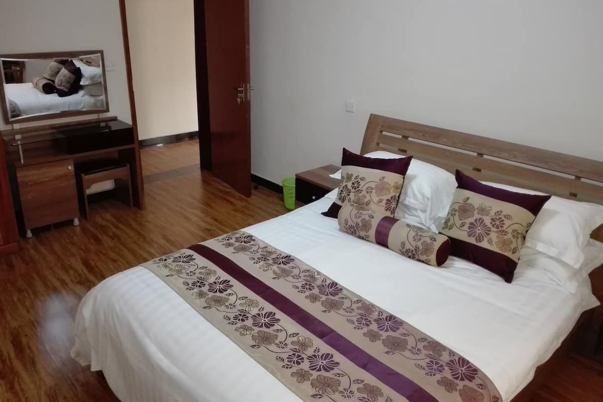 Appartement, 2 chambres, non-fumeur | Fer et planche à repasser, accès au Wi-Fi (inclus), literie fournie