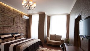 Executive-sviitti | Tallelokero huoneessa, silitysrauta/-lauta, ilmainen Wi-Fi