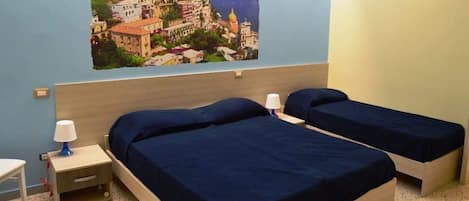 Triple Room, Private Bathroom | Desk, free WiFi, bed sheets