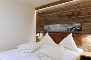 Literie hypoallergénique, coffres-forts dans les chambres, bureau