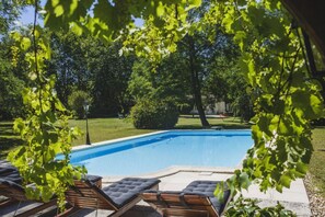 Outdoor pool, pool umbrellas, pool loungers