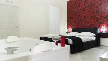 Suíte exclusiva, 1 cama Queen (Elegant Suite) | Banheira de hidromassagem