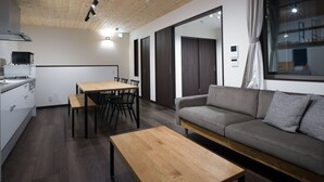 A modern kitchen with a dining area and a living space. - Rakuten STAY HOUSE x WILLSTYLE SASEBO (Sasebo)