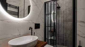 Shower, free toiletries, hair dryer, bathrobes