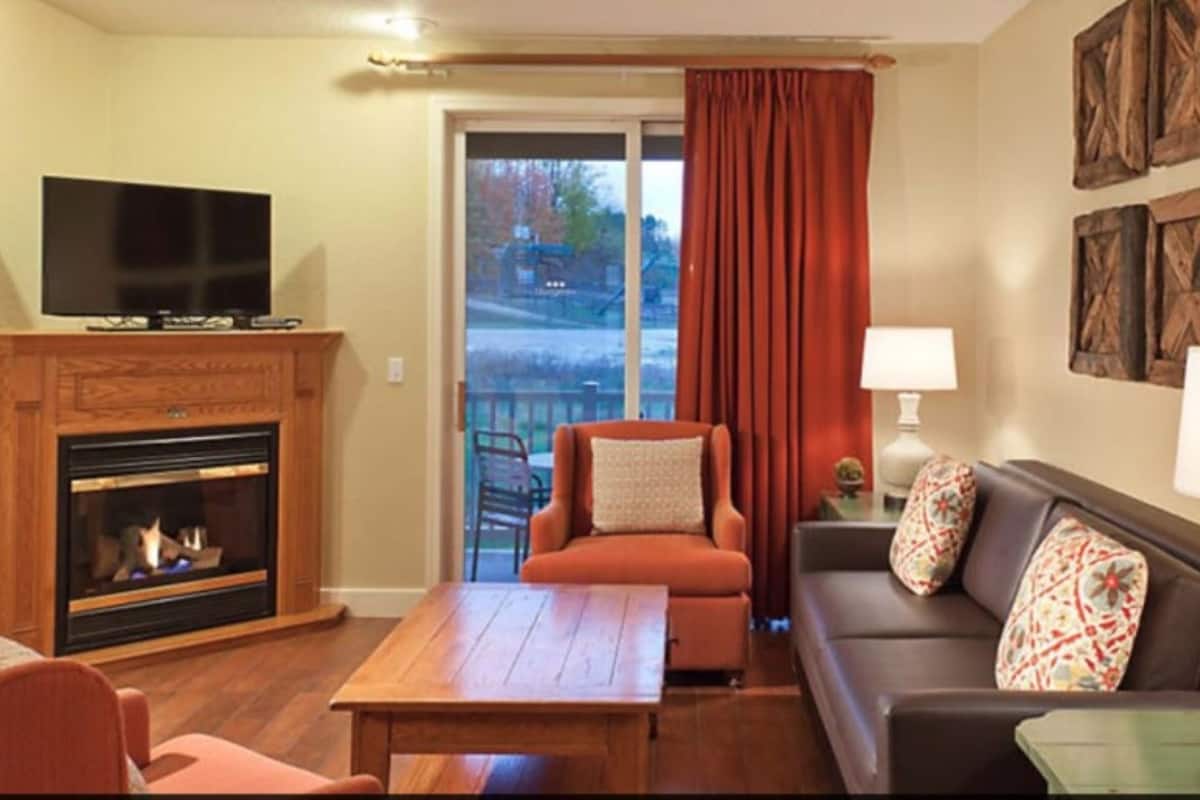 Suite, 2 Bedrooms, Fireplace | Living area | Flat-screen TV, fireplace, DVD player
