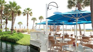Outdoor dining - Tradewinds Resort Waterslide Studio 103 (St. Pete Beach)