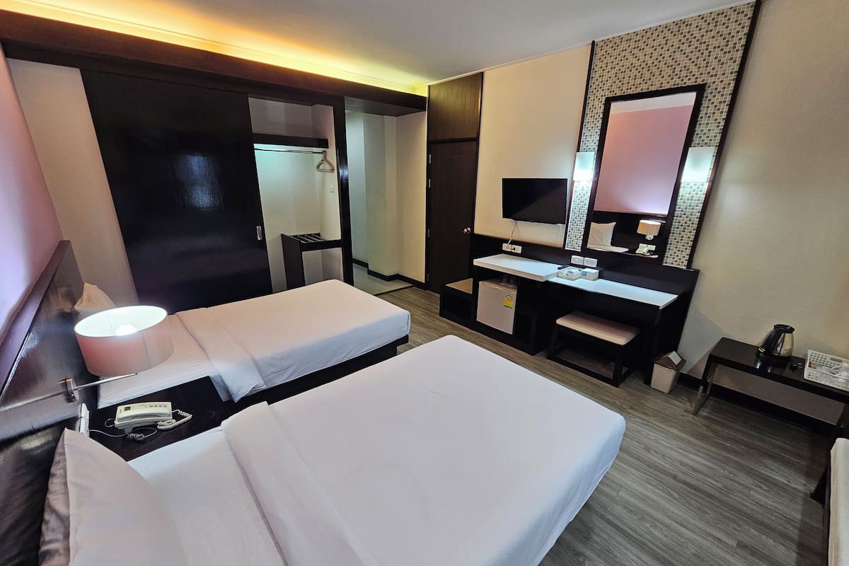 Superior Twin kamer | Een minibar, een kluis op de kamer, verduisterende gordijnen