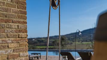 Outdoor pool, open 9:00 AM to 10:00 PM, sun loungers