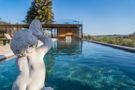 Outdoor pool, open 9:00 AM to 10:00 PM, sun loungers