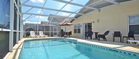 A heated pool, pool loungers