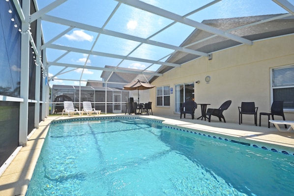 A heated pool, sun loungers