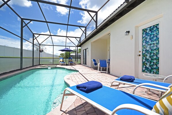 A heated pool, pool loungers