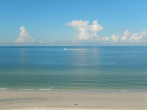 A beach with a clear sky and calm sea. - DIRECT BEACHFRONT - PENTHOUSE CORNER UNIT!!  Totally Renovated! (Indian Shores)