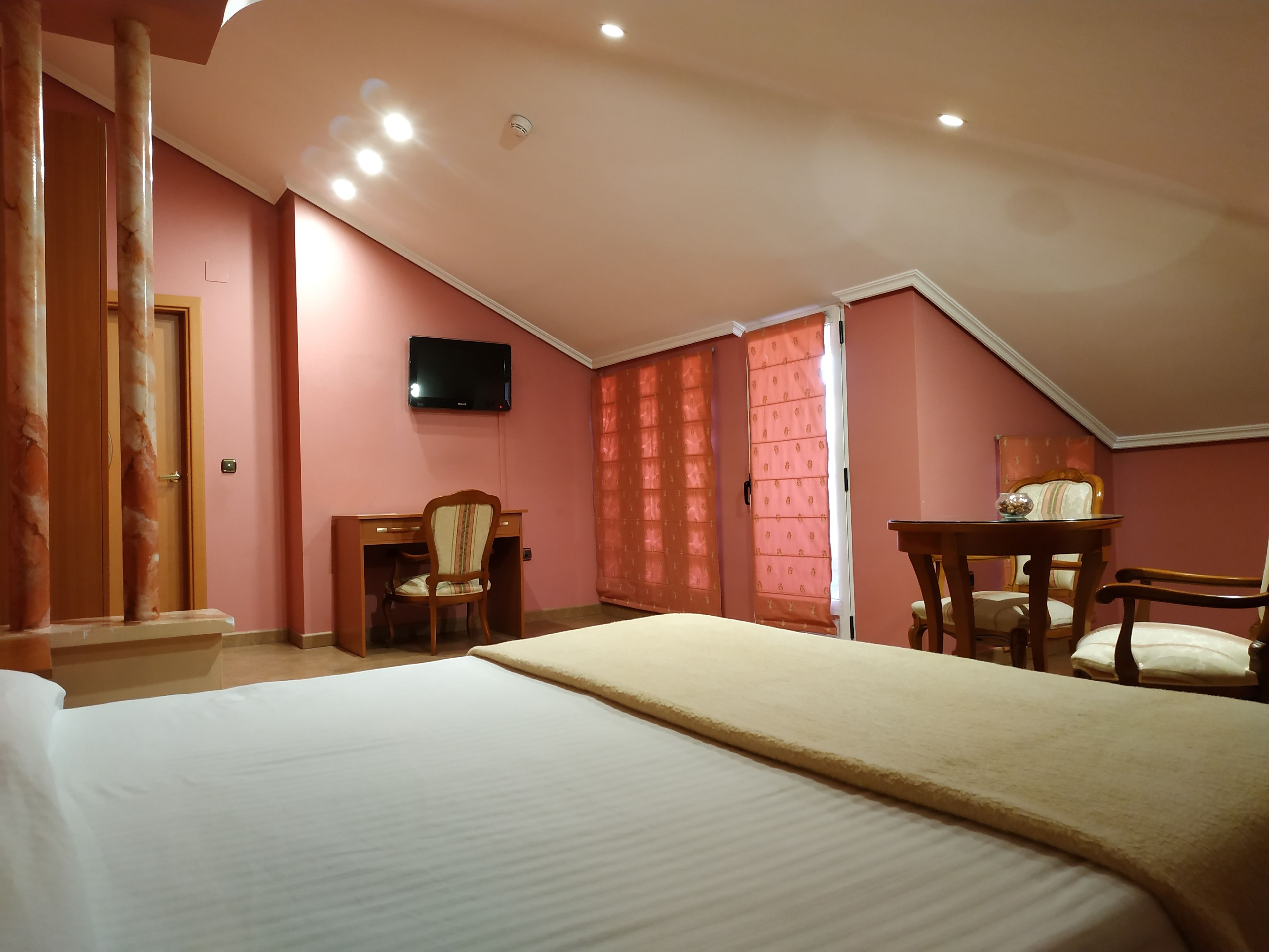 Suite, 1 Queen Bed, Non Smoking, City View | Individually decorated, individually furnished, desk, blackout drapes