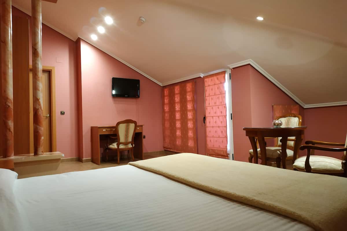 suite, 1 queen bed, non smoking, city view | individually decorated, individually furnished, desk, blackout curtains