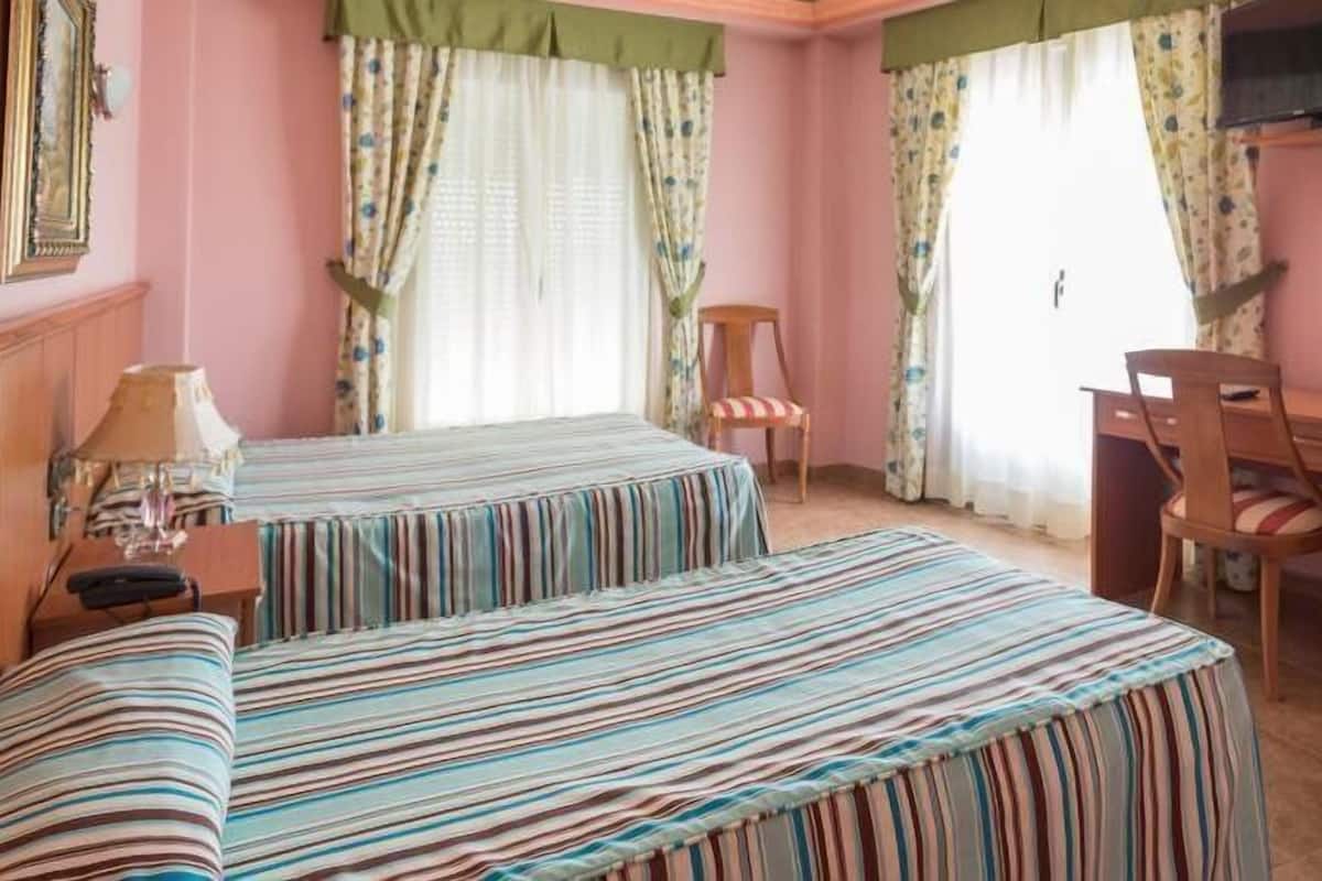 Individually decorated, individually furnished, desk, blackout curtains