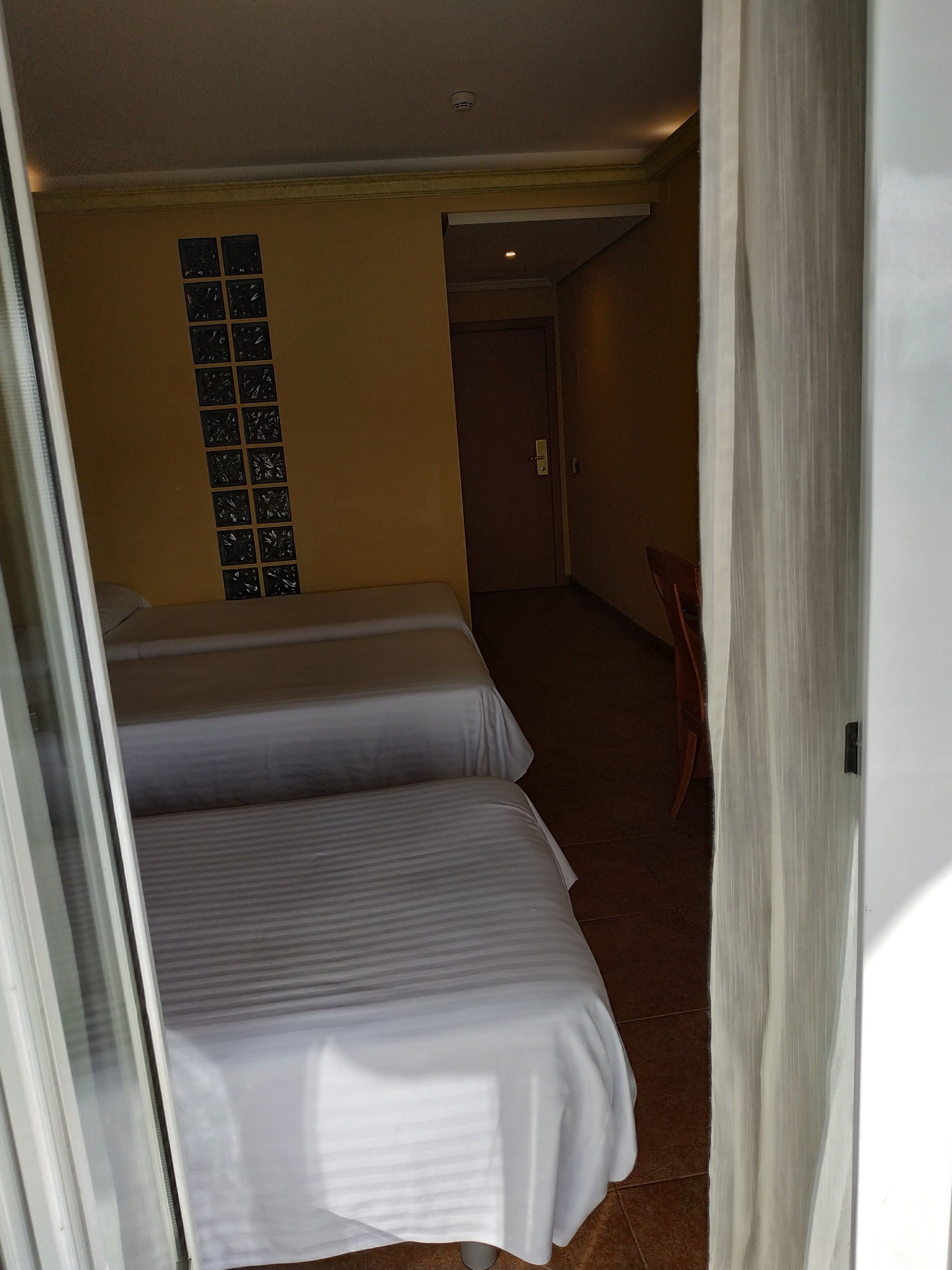 triple room, 3 single beds, non smoking, city view | balcony