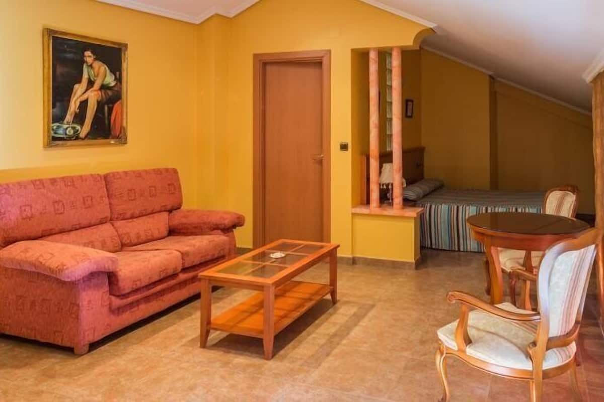 suite, 1 queen bed, non smoking, city view | living room | flat-screen tv