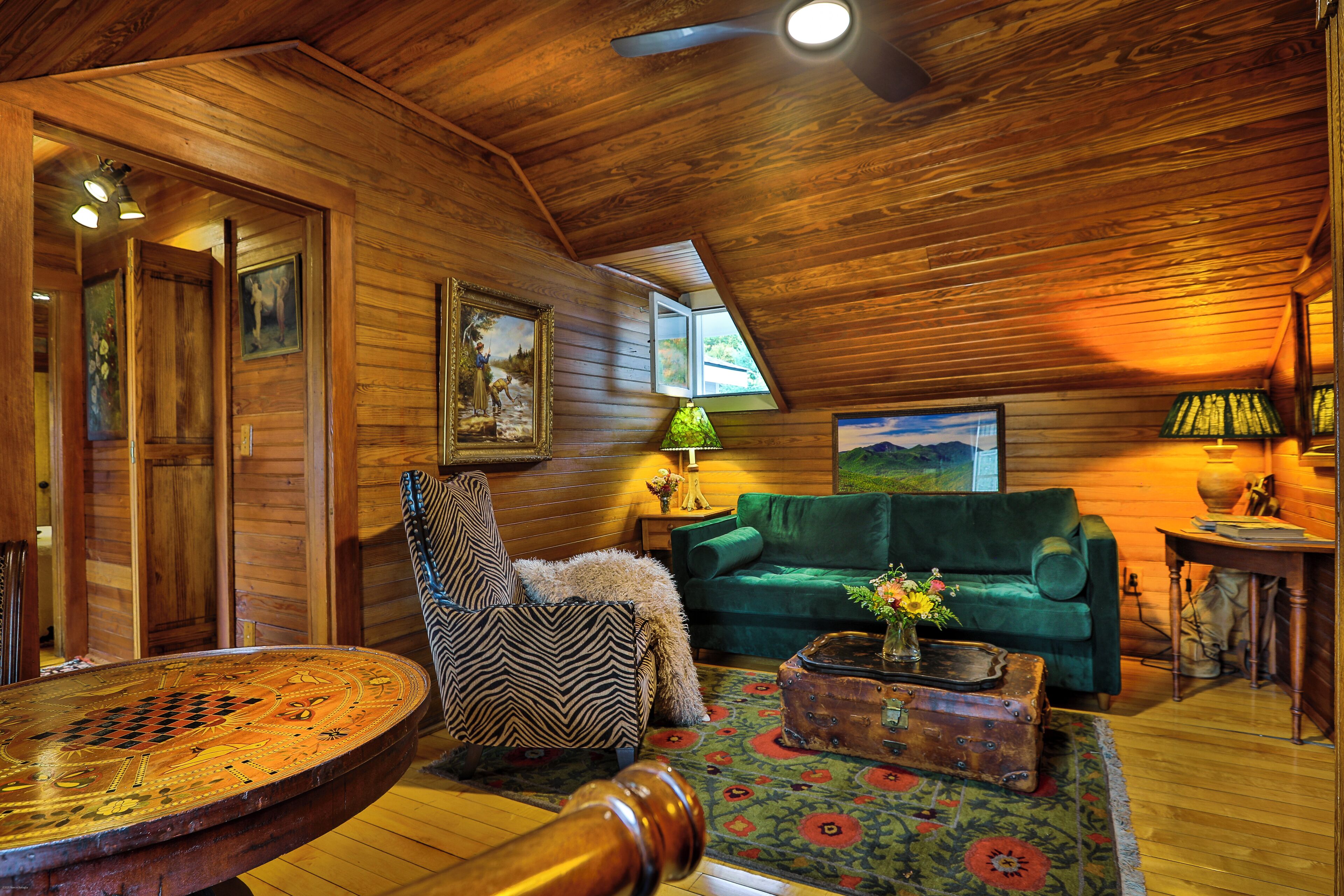 The LaHart Suite | Living area | 26-inch LCD TV with satellite channels, TV, Netflix