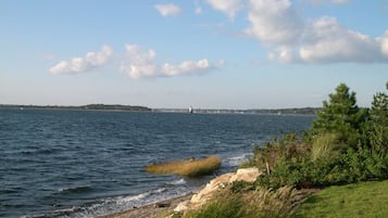 On the beach, sun-loungers, beach towels