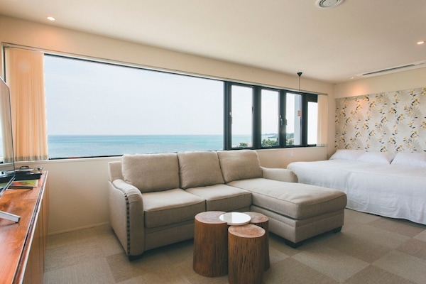 Executive suite, 3 slaapkamers, niet-roken, uitzicht op zee | Uitzicht op strand/zee