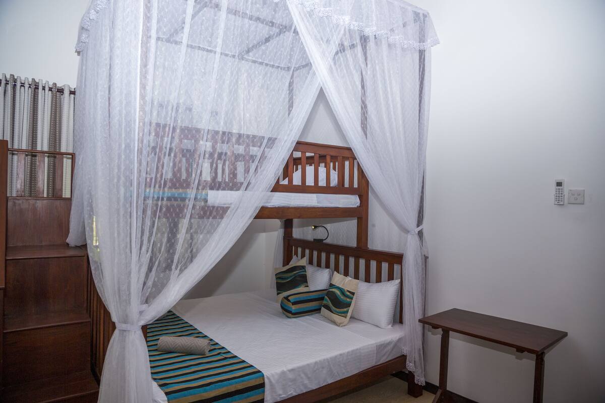 Family Triple Room, Multiple Beds, Non Smoking, Garden View | Individually decorated, individually furnished, blackout drapes