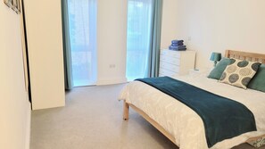 2 bedrooms, blackout curtains, iron/ironing board, travel cot