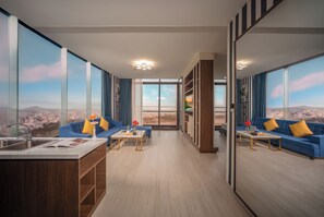 Premier Double Room, 1 Bedroom, City View | Living area | 40-inch flat-screen TV with cable channels, TV