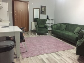 Apartment | Living area | 25-inch LED TV with satellite channels, TV