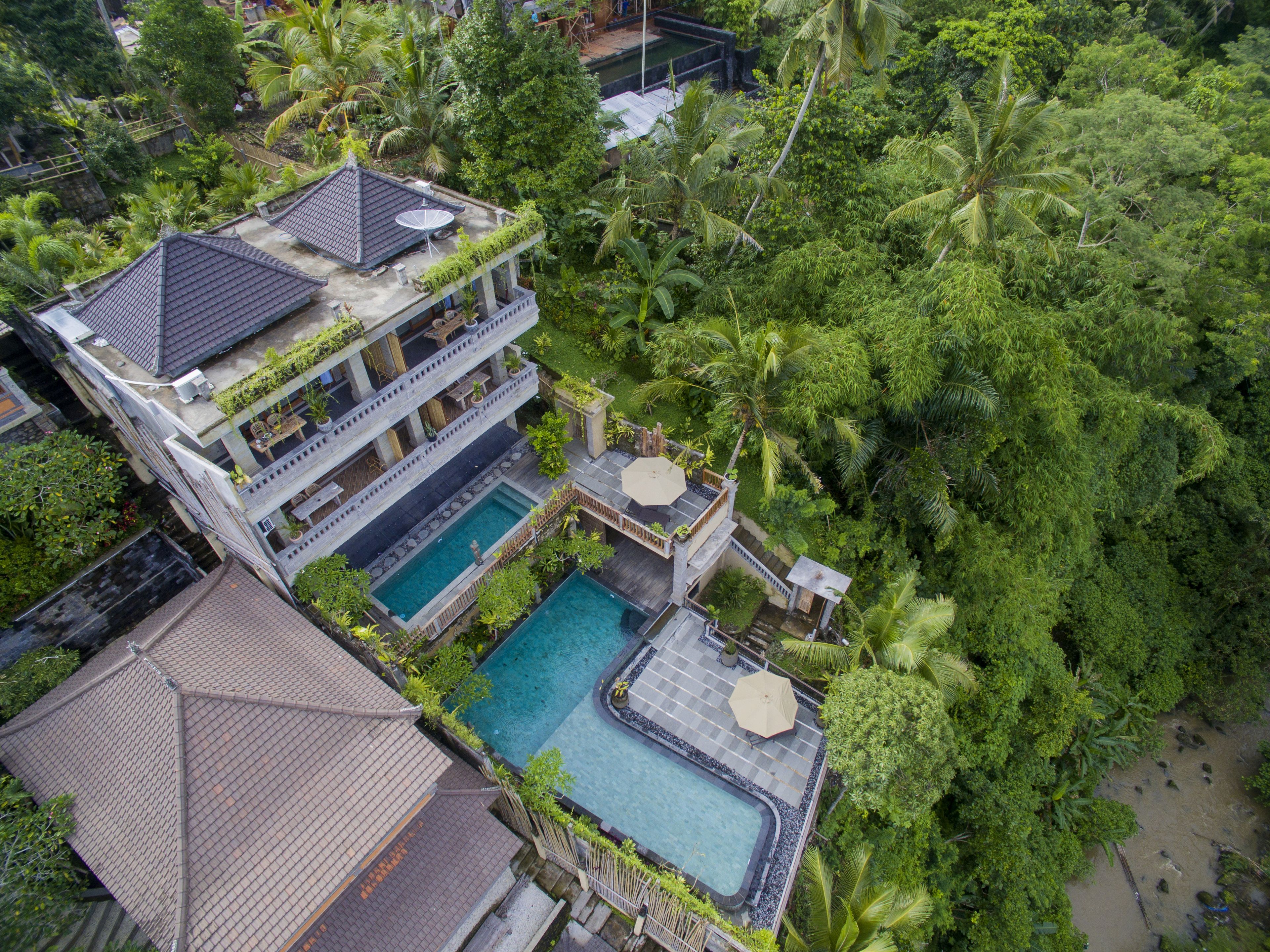Indoor pool, outdoor pool, pool umbrellas, pool loungers