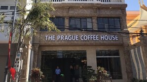 A building with a sign reading "The Prague Coffee House." - Prague Hotel Vung Tau (Ho Chi Minh City)