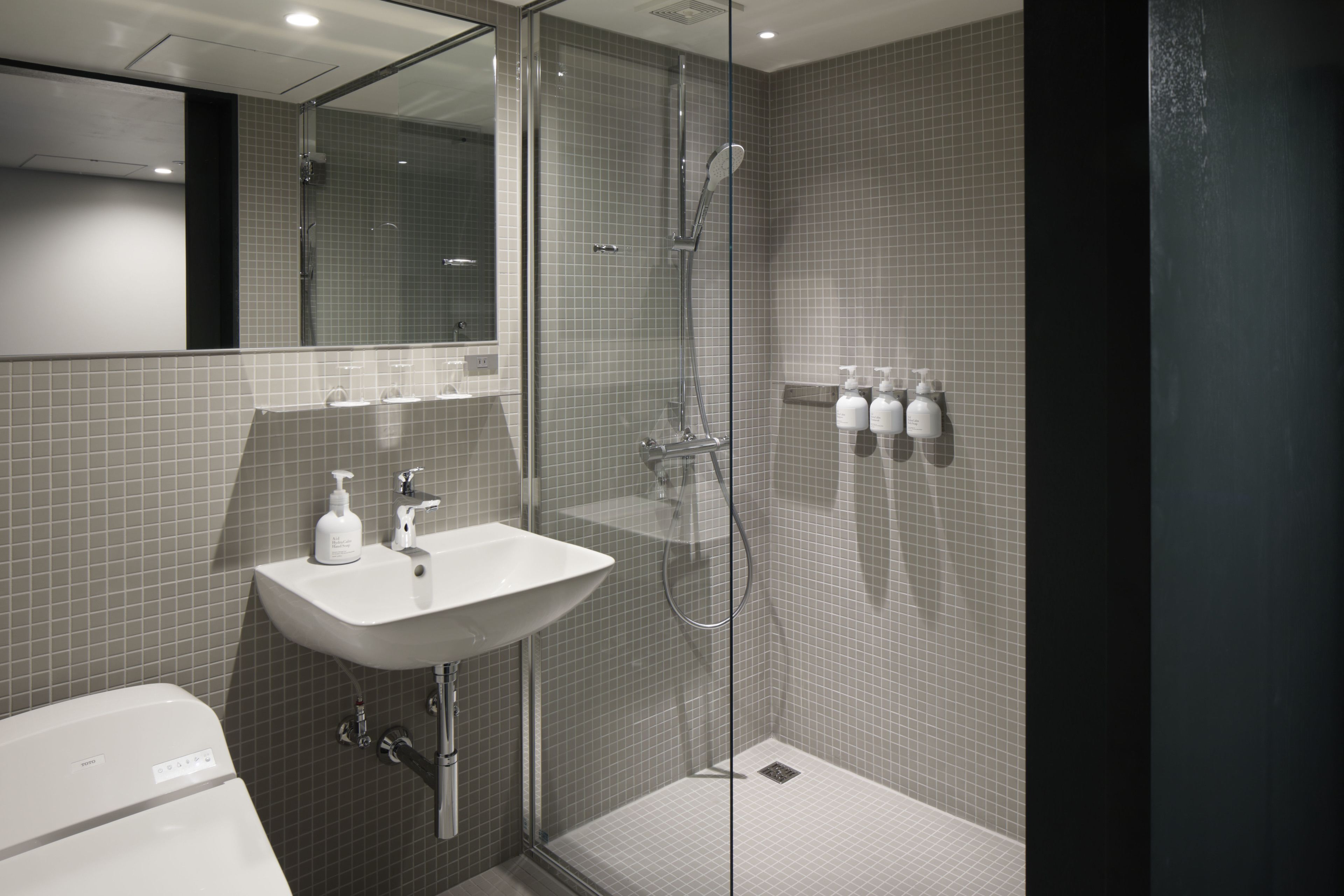 standard triple room, multiple beds, non smoking, city view | bathroom amenities | free toiletries, hair dryer, slippers, electronic bidet