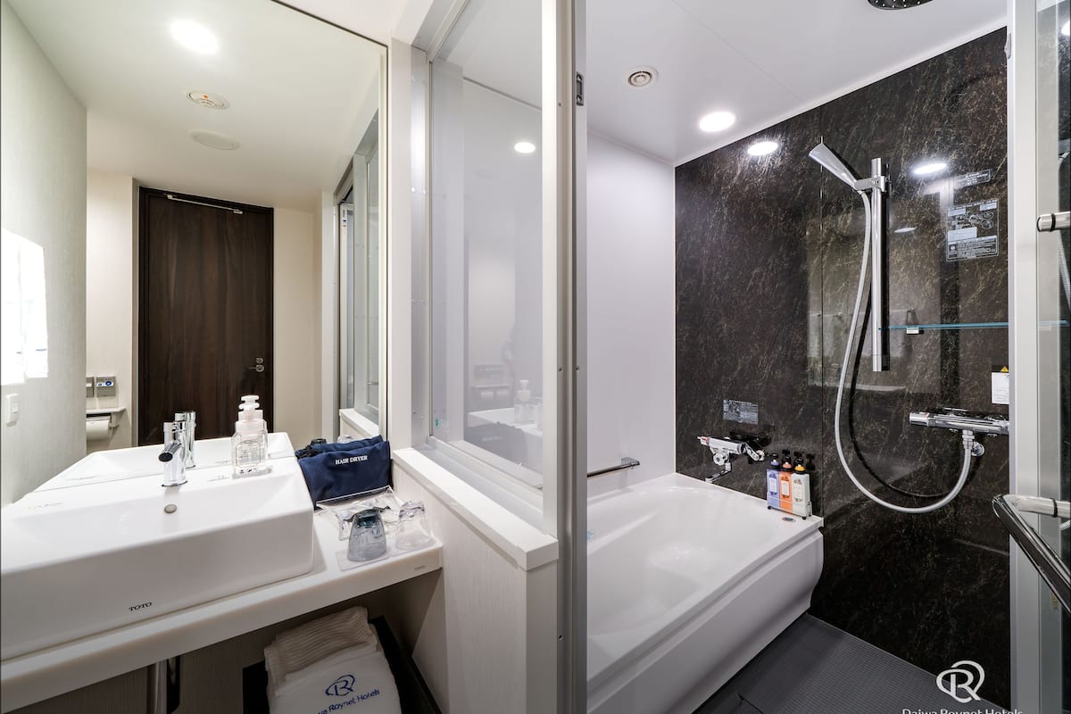 separate bathtub and shower, deep-soaking bathtub, free toiletries