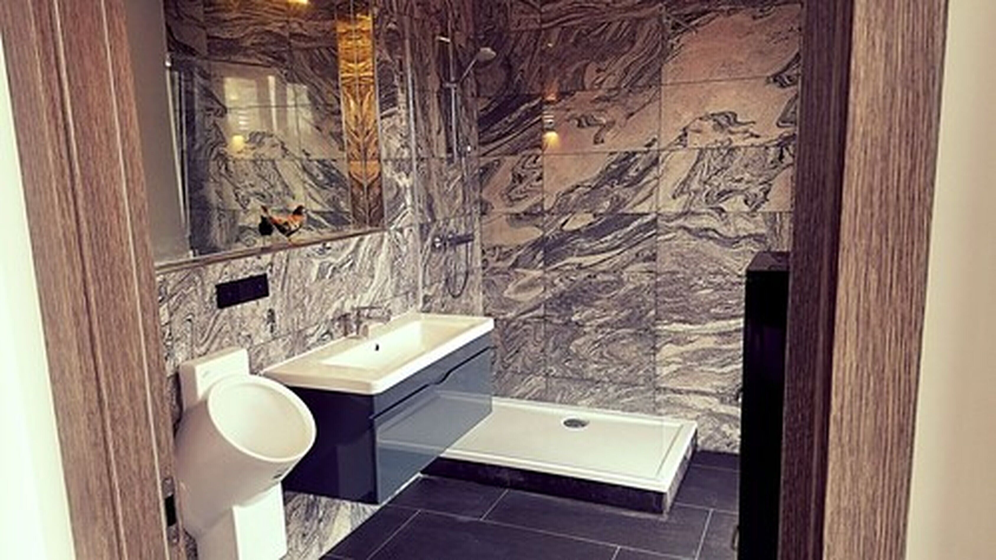 deep-soaking bathtub, hair dryer, towels