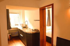 Apartament familiar, 2 dormitoris | Cuina privada | Frigorífic i microones