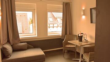 Standard Double Room Plus - Refrigerator & Microwave | Living area | 40-inch LED TV with satellite channels, TV, pay movies