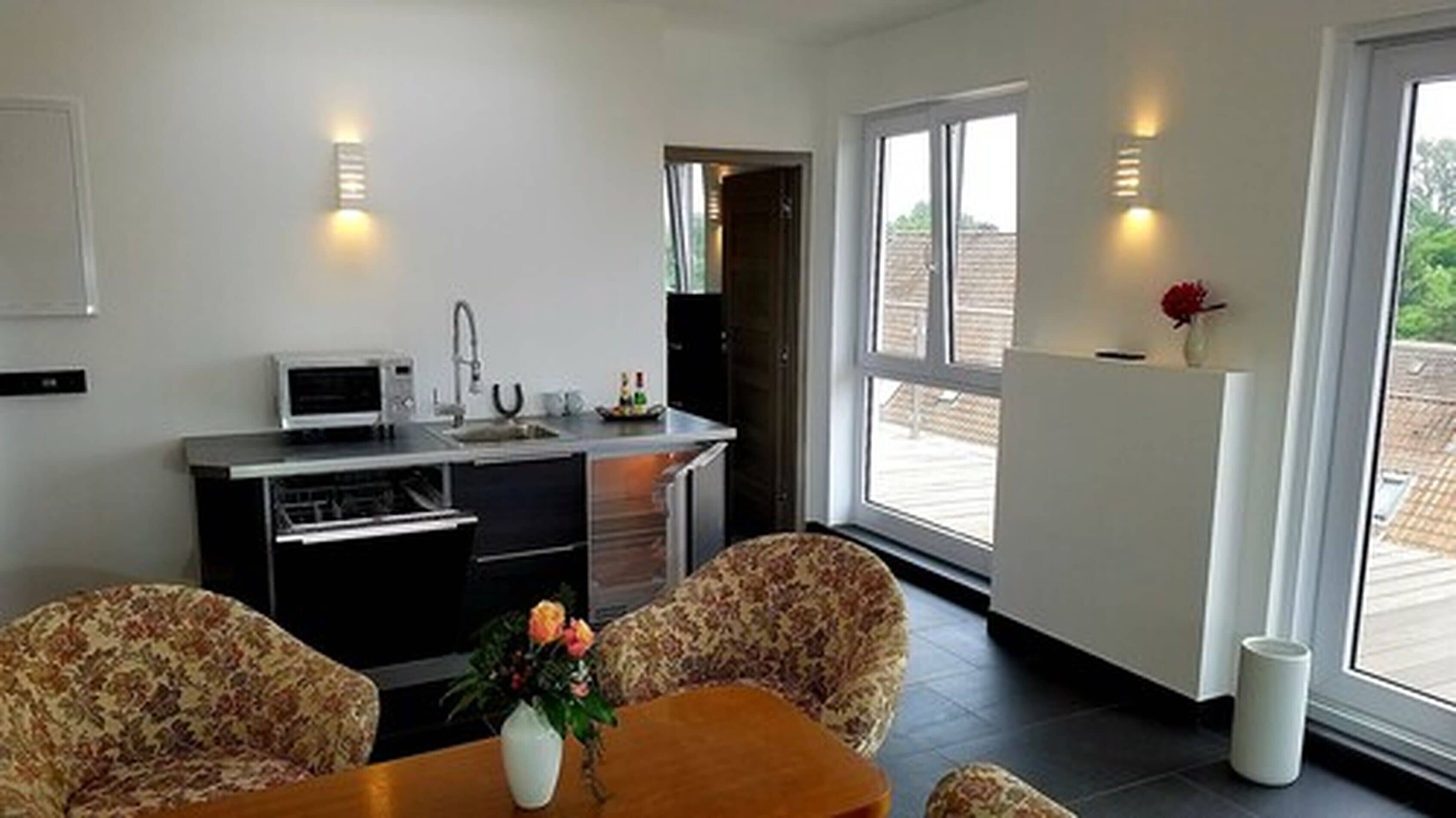 premium suite, 1 bedroom, microwave, city view (nord) | living room | 40-inch led tv with satellite channels, tv, pay films