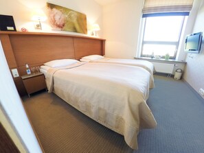 Standard Double or Twin Room, City View | Iron/ironing board, cribs/infant beds, rollaway beds, free WiFi