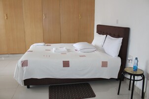 Premium bedding, iron/ironing board, free WiFi, bed sheets