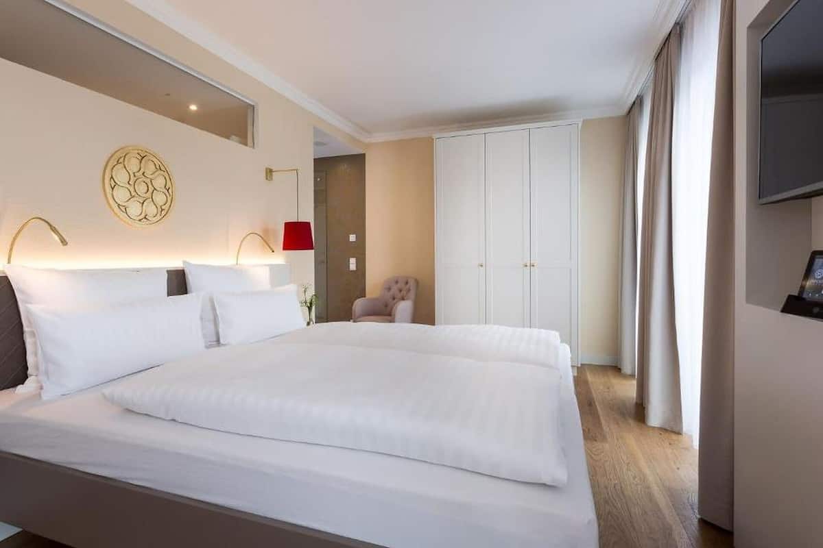 superior double room | in-room safe, individually decorated, desk, blackout curtains