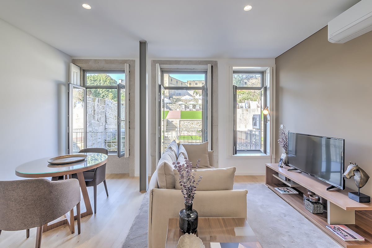 Superior Apartment, 1 Bedroom, Pool Access, Pool View | Living area | Flat-screen TV