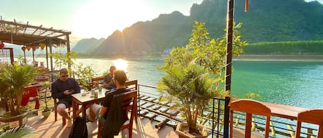 Deluxe Double Room, River & Mountain View | Terrace/patio