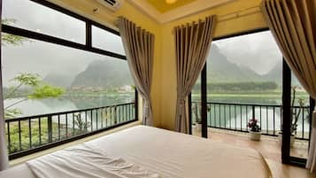 Deluxe Double Room, Balcony, River & Moutain View  | Individually decorated, individually furnished, desk, laptop workspace