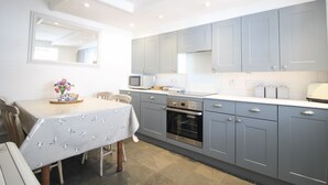 Cottage | Private kitchen | Dishwasher, high chair, cookware/dishes/utensils - Beach Hill Cottage (Truro)